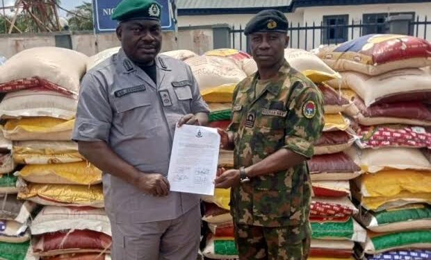Navy Hands Over Seized Rice To Customs