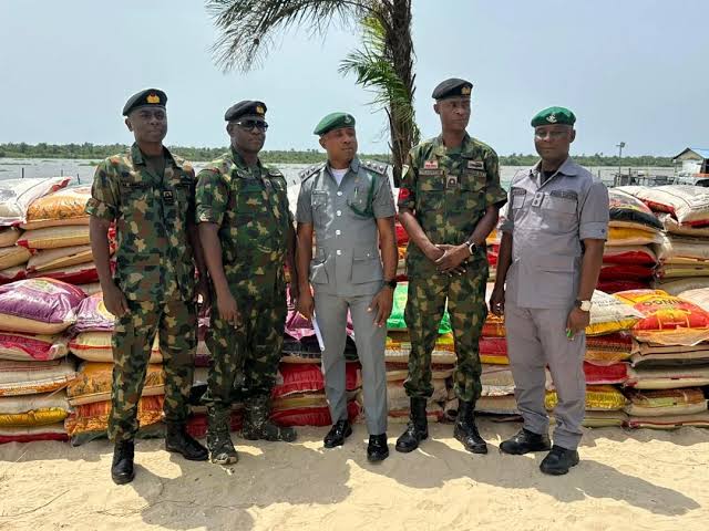 Navy Hands Over Seized 250 Bags Of Rice To Customs In Badagry